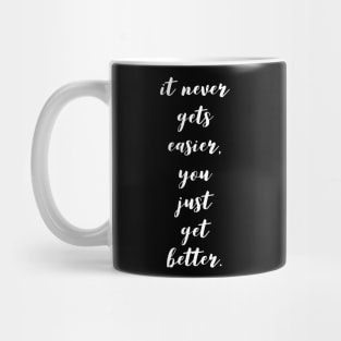 it never gets easier you just get better Mug